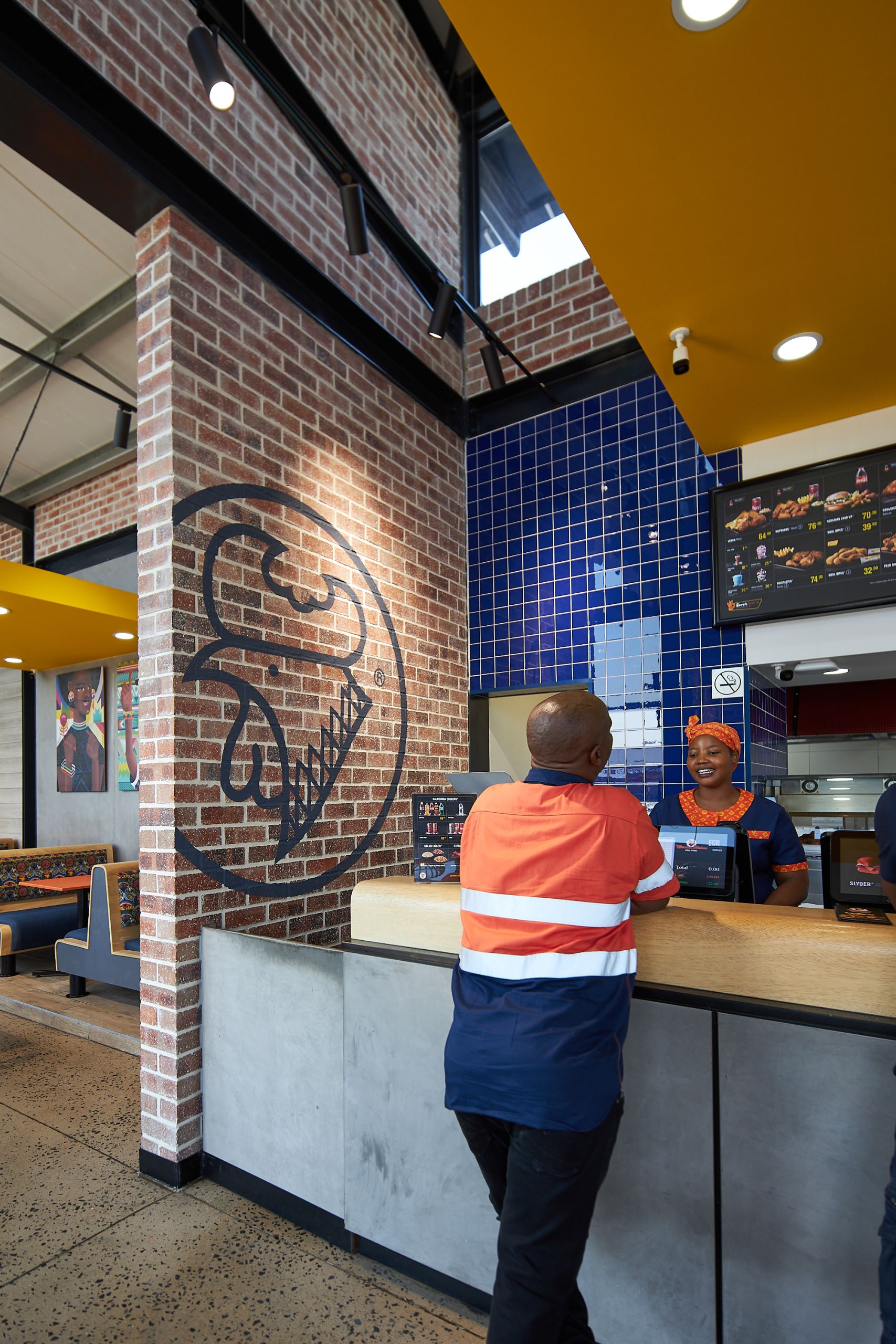 New Look Chicken Licken by Boogertman and Partners_featuring Corobrik Nevada Travertine with a rustic German Schmear effect