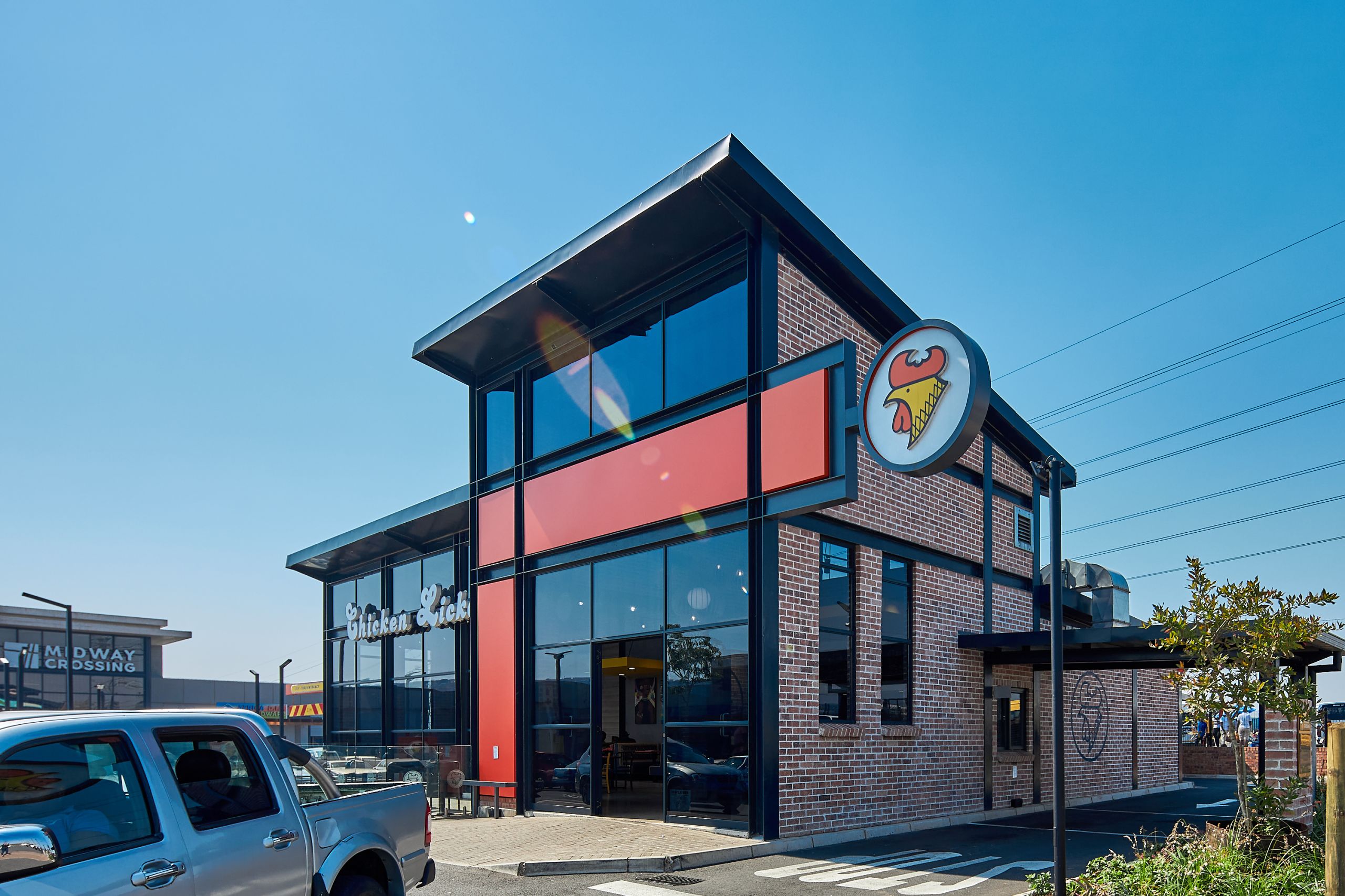 New Look Chicken Licken by Boogertman and Partners_featuring Corobrik Nevada Travertine with a rustic German Schmear effect