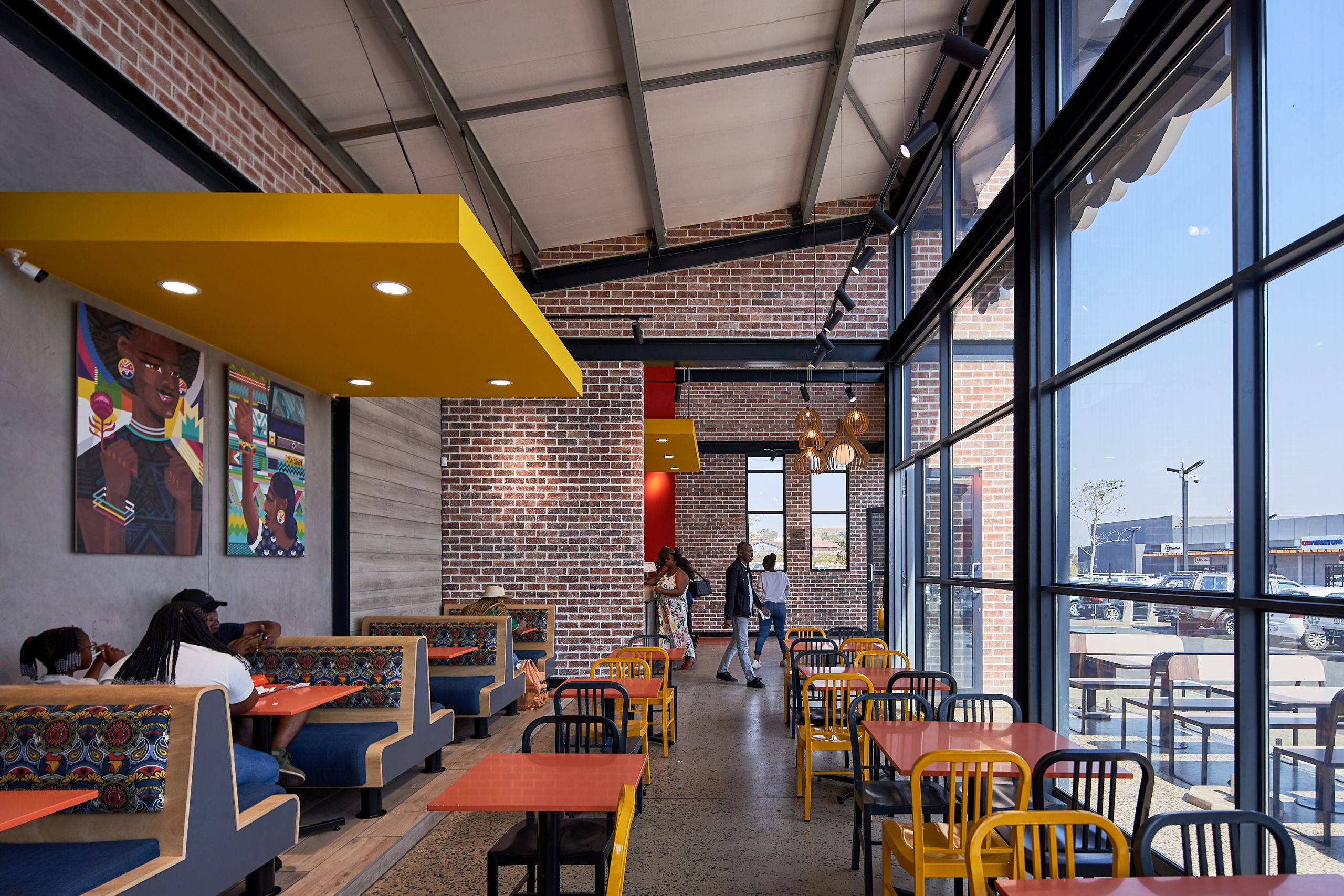 New Look Chicken Licken by Boogertman and Partners_featuring Corobrik Nevada Travertine with a rustic German Schmear effect