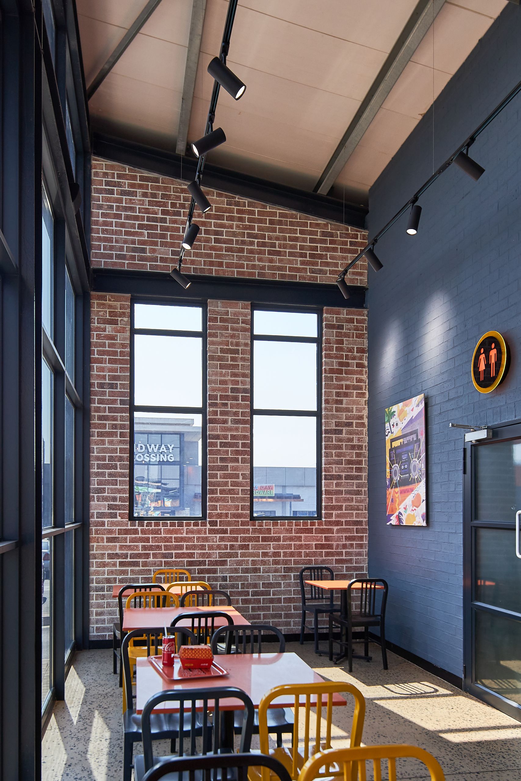 New Look Chicken Licken by Boogertman and Partners_featuring Corobrik Nevada Travertine with a rustic German Schmear effect