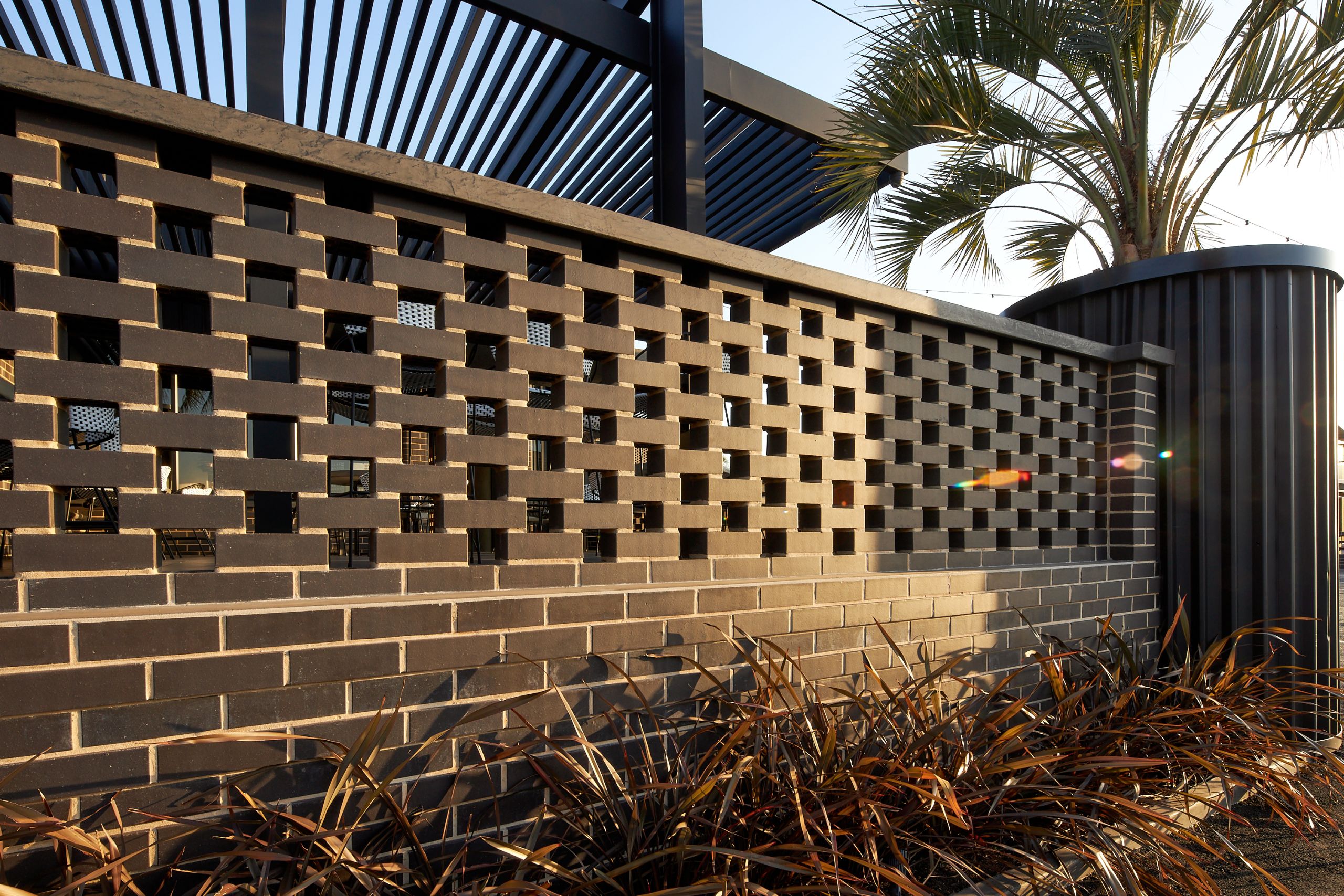 Hit and miss brick screen wall created with Corobrik Black Brick Satin for Kota Joe Roadhouse