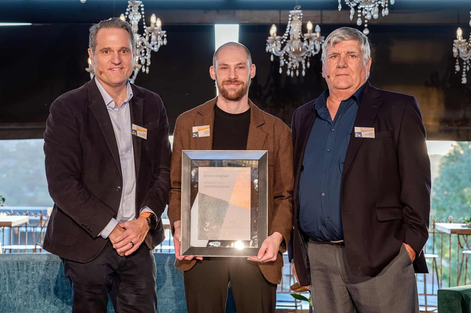 Corobrik CEO DEan Thompson; Comendation Award Winner Enrico Deysel; Corobrik Chairman Peter du Trevou