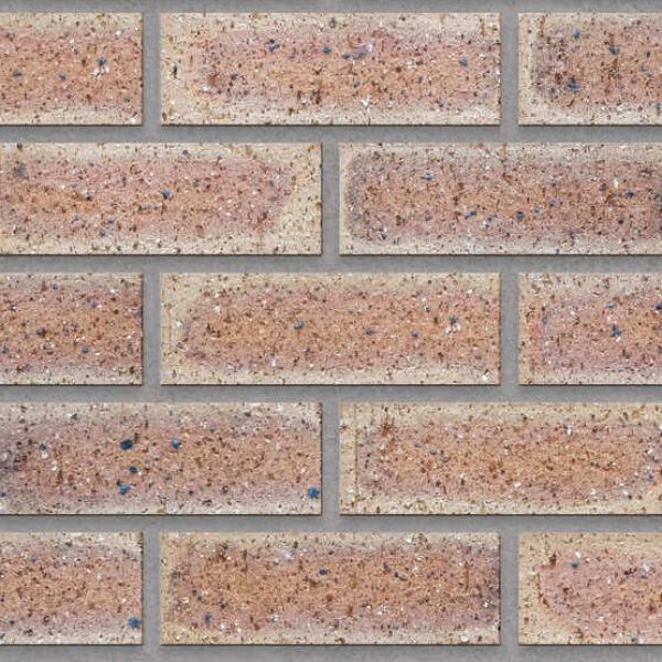 Textured autumn wheat travertine bricks in warm beige and brown tones arranged in a uniform pattern.